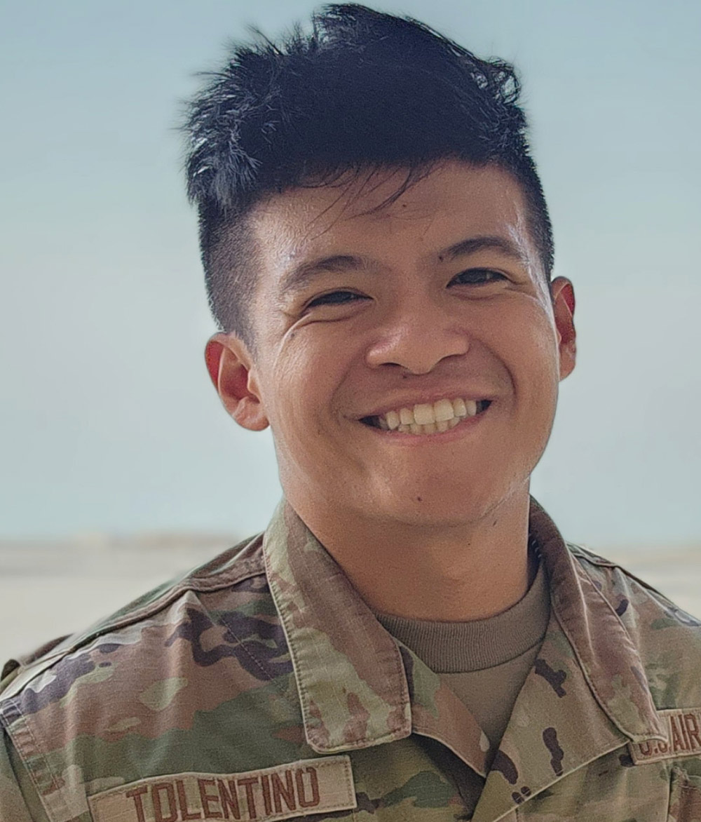 headshot of soldier smiling in uniform