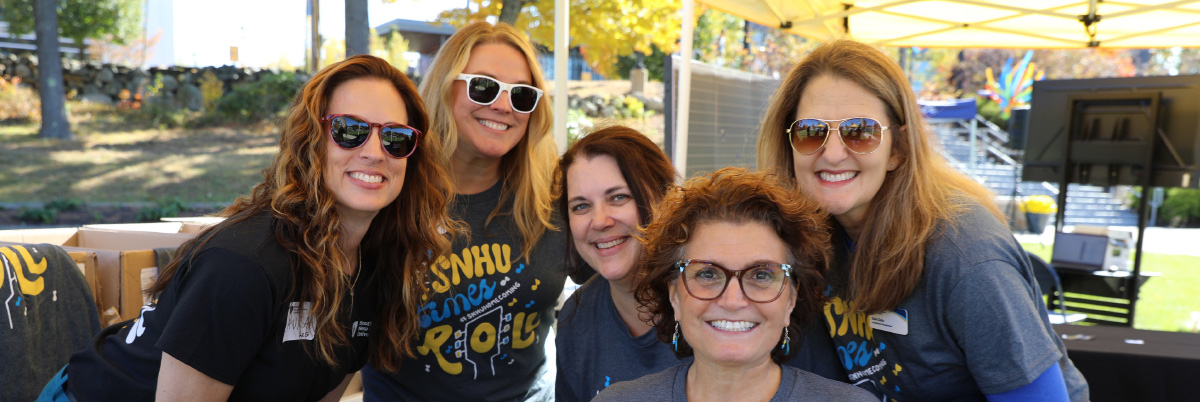 group photo of Gabi Zolla and four of her colleagues