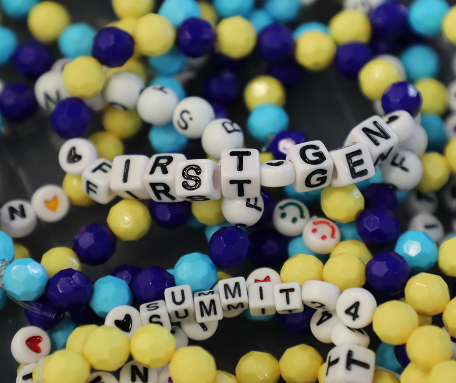 beaded bracelets in blue and yellow with various words spelled on them with letter beads